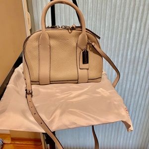 Brand new Coach leather mini bag.